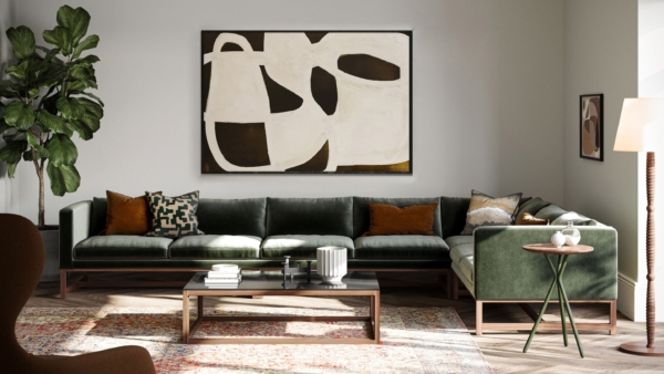 A room set featuring a modular Orten sofa, upholstered in dark green fabric, by Lyndon.