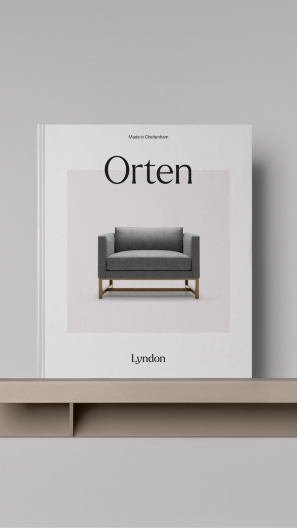 A series of Lyndon brochure covers positioned on a shelf.