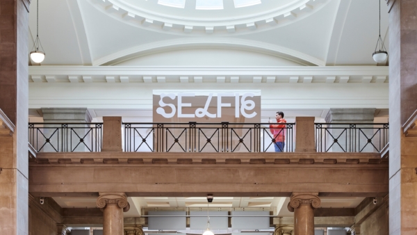 An interior photograph of National Museum Cardiff showing the 'Selfie' mirror box.