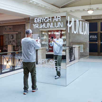 An interior photograph of National Museum Cardiff showing the 'Selfie' mirror box.